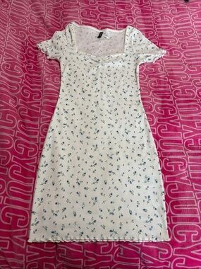 Divided White Ribbed Mini Dress with Blue-Green Floral Sprigs